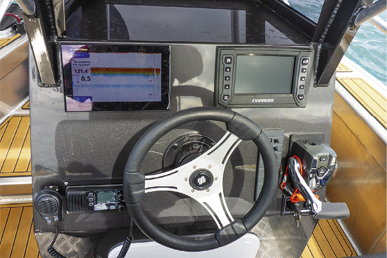Electronics are a Furuno DB9 sonar/GPS 7" touch screen MFD; an Icom VHF and an Evinrude Icon Touch 7.0 CTS.