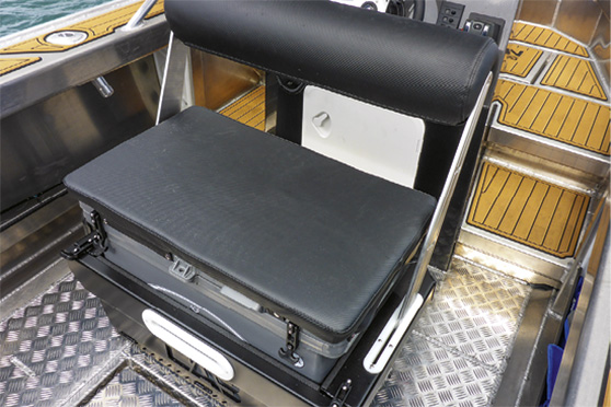 Seating behind the console is provided by an Icey-Tek bin with a padded top and reversing roll-back bolster, which can be used for fish stowage.