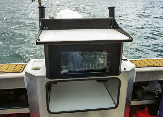 Along with two rod holders, the bait station includes a removable cutting board, a mackerel-sized live bait tank and knife slots.