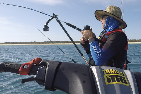 Kirk hooked up on the baby black marlin.