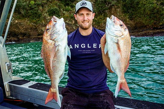 The writer with a couple of representative west coast snapper.