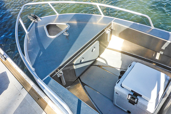 Dry storage is provided by a large, off-the-deck locker behind the anchor well.