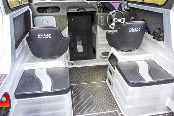 The level of finish is high. A livebait tank and a kill tank are fitted under the bench seats.