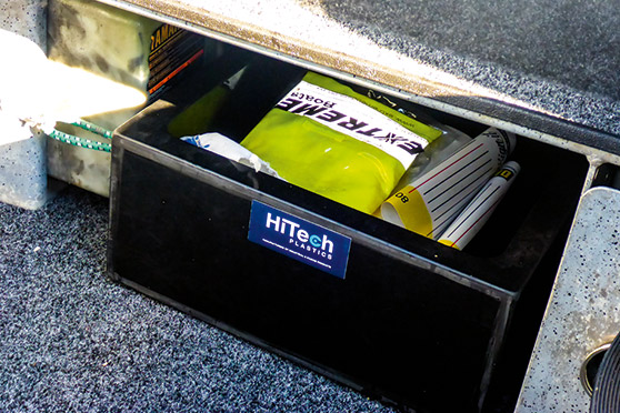 A custom made storage box fits under the transom.