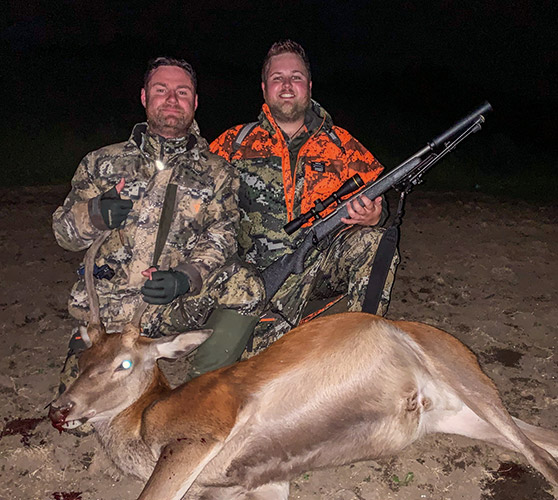 Nick Herbert (left) and the writer with the results of the fourth leg of the Southland Quad - one of the three deer shot out of a triple.