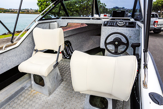 Reversible seats from Absolute Marine add a touch of luxury to Oarsumm's cockpit without taking up too much space.