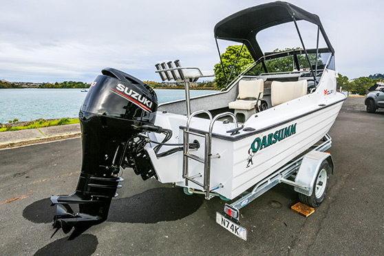 The stern quarter shot shows the clean, fresh lines of the Mclay hull.
