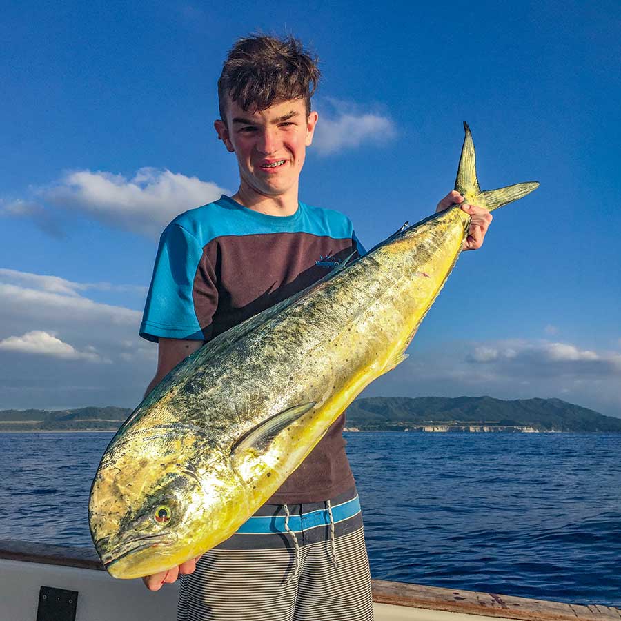 Hayden and his tasty mahimahi caught trolling off Waihau Bay.