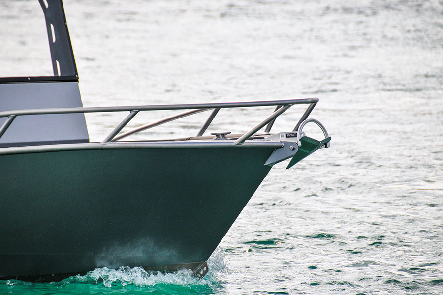 A Rocna plough anchor is permanently mounted in the fairlead under the bow rails.