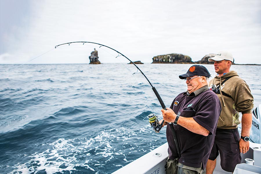 Not sure if the grimace is a result of the angler putting the heat on the kingfish, or the fish putting the hurt on an angler in need of a gimbal.
