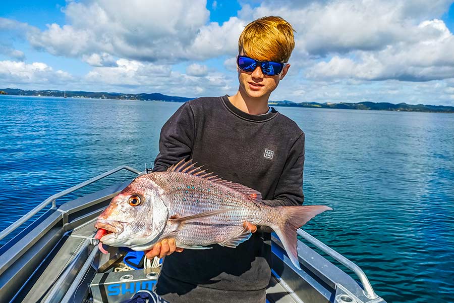  The unique action and retrieve style inherent in soft-baits has revolutionised snapper fishing in New Zealand. Jack Worthington with his Bay of Islands fish.