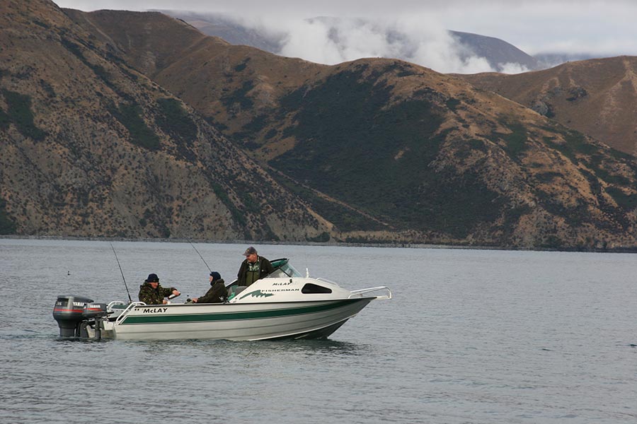 Trolling for salmon at Lake Coleridge. When the southerly hits the coast, you will often get better weather inland.
