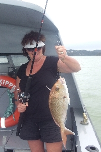 Wife and myself fishing first big fish for her